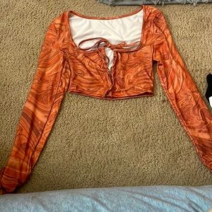 Size small, Tan brown color, never worn